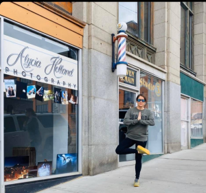 Tree pose in front of local business